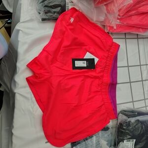 Heritage Dolphin Shorts in Coral